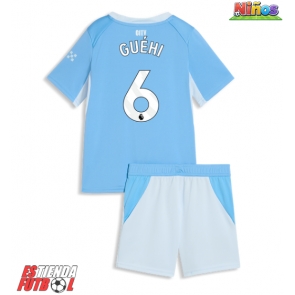 Manchester City Marc Guehi #6 Primera Equipación Niños 2026-27 Manga Corta (+ Pantalones cortos)